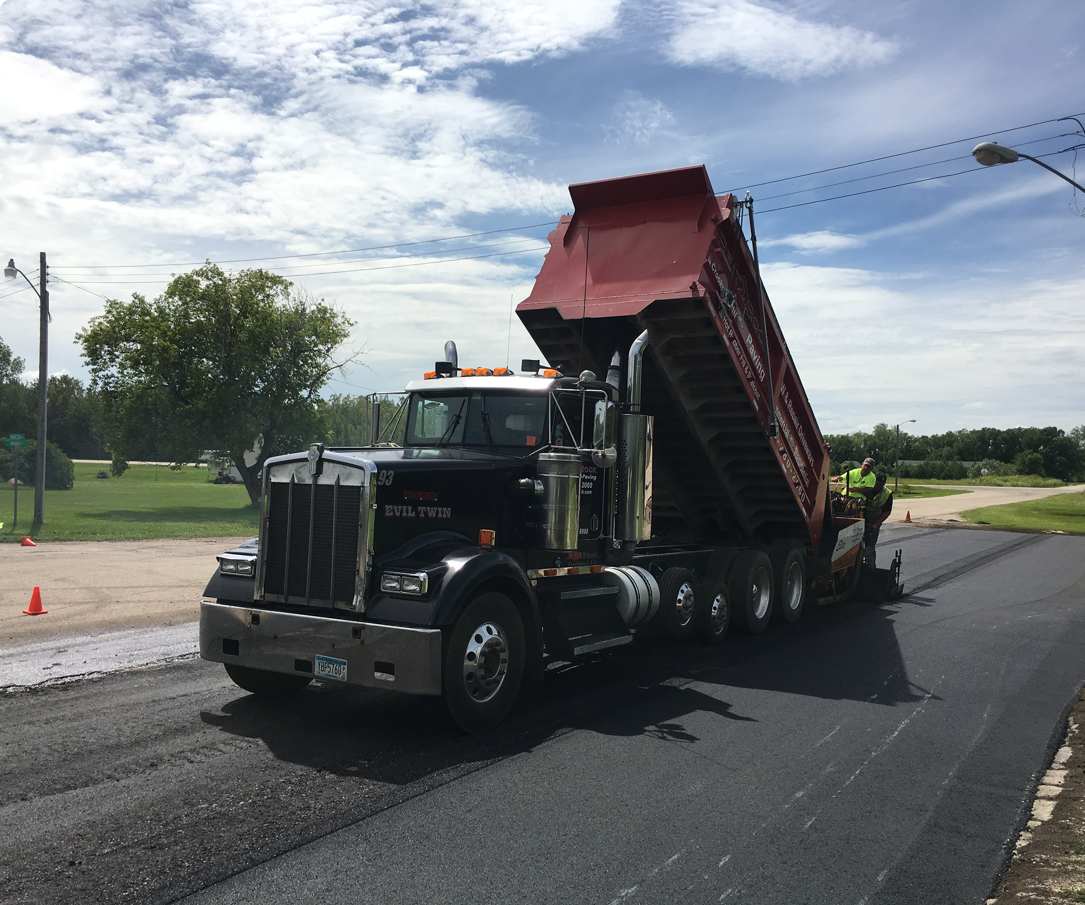 Road construction with dump truck